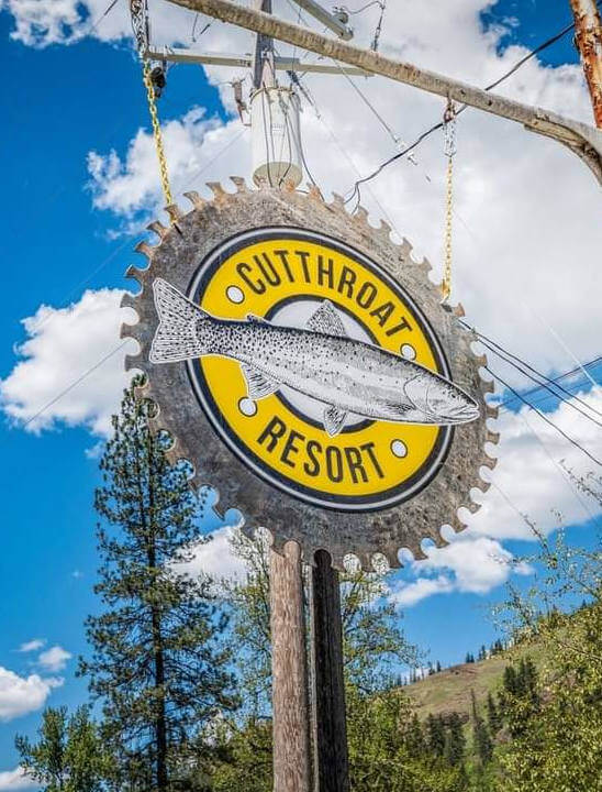 hanging metal sign for Cutthroat Resort